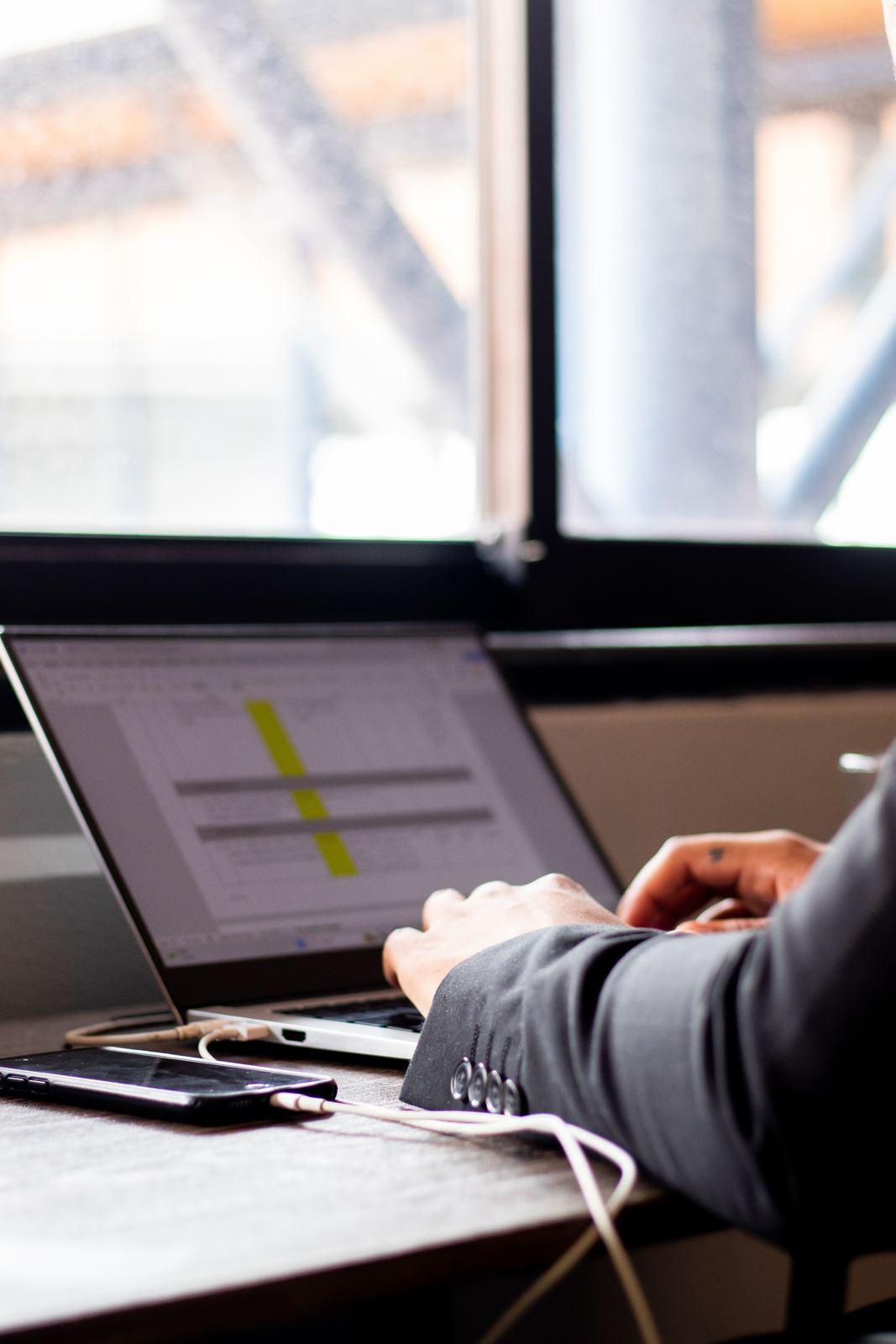 A laptop showing a project plan