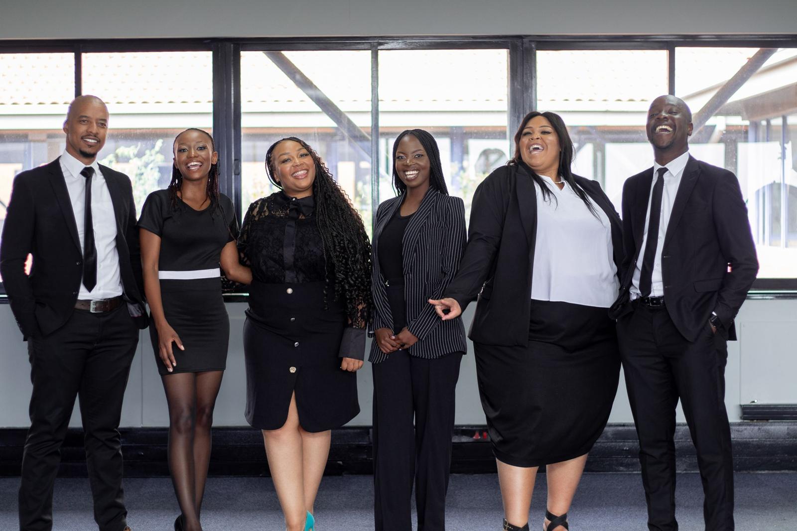 The Onyx team together, laughing, at the Midrand office